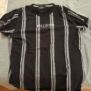 Hollister California; Navy base color; Blue and White Vertical Striped Shirt